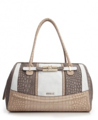 An untamed style with refined appeal. This embossed design from GUESS features an all-over crocodile print with shiny goldtone hardware and subtle signature detail at front.
