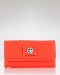 MARC BY MARC JACOBS perfects practical style with this leather wallet, accented by the label's signature turnlock. In a trend right hue, it's a haute piece of fashion hardware.