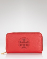 Tory Burch proves practical style can make a statement with this logo-perforated leather wallet, boasting ample slots for your essentials. In your purse or palm, it's as versatile as they come.