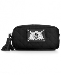 Keep it packed all summer long for weekend getaways or when you need your beauty must-haves close at hand. This classed-up cosmetic bag from Juicy Couture holds it all with ease. Separate zipped compartments with extra pockets offer superb organization.