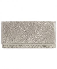 Add some optical illusion to your evening out with this intricately woven leather clutch from Cole Haan. Sleek and slim design discretely stows phone, lipstick and ID.