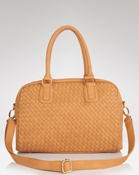 Texture and a top handle make Cornelia Guest's woven satchel trend-right. Crafted from a unique faux leather, the bag revels a humane and haute statement.