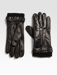 A cold weather favorite, shaped in rich Italian leather with a cashmere lining and a ribbed-knit trim.About 10 longCashmere linedLeatherDry cleanMade in Italy