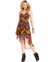 Get your street-chic fashion fix with a dress that unites the season's hottest trends: tribal-print and high-low design! From American Rag.