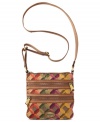 Take on the tapestry trend with this go-anywhere colorful crossbody from Fossil. Crafted from supple leather and accented by bold embroidery and custom hardware, it's the ultimate accessory for every it-girl on-the-go.