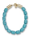 Tap into this season's turquoise jewelry trend with this chunky beaded necklace from MICHAEL Michael Kors, sure to enliven every neckline.