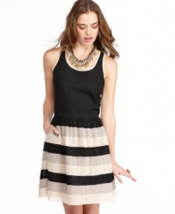 Sporty style meets ladylike cool on this dress from American Rag that pairs a racerback top with the femininity of a striped skirt!