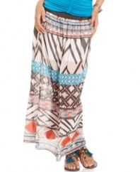 Global fixation! Sporting a perforated, faux-leather waistband and an adventurous print , this chiffon maxi skirt from Baby Phat goes the distance in style.