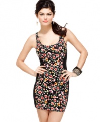Blocks of banding at the sides create a sleek hourglass curve on this body-hugging, floral print tank dress from Material Girl!