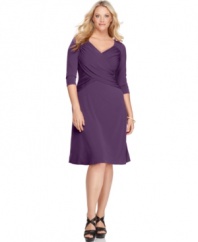 A slenderizing silhouette beautifully defines Elementz' three-quarter sleeve plus size dress, highlighted by a flattering crisscross front and slimming panel-- wear it from day to play!