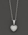 Wear your diamonds close to your heart with this romantic pendant, set in 14K white gold.