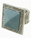 Laid-back glamour. GUESS's unique cocktail ring is the perfect blend of blue jeans Friday and rock star Saturday. A chic denim pyramid is surrounded by sparkling crystal details. Set in silver tone mixed metal. Ring stretches to fit finger.