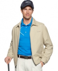 Confront a cooler weekend forecast with the clean, classic style of this  SHARK Greg Norman for Tasso Elba fitted zip-up jacket.