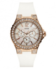 A regal timepiece adorned with crystal shimmer, rosy hues and bold whites, by GUESS.
