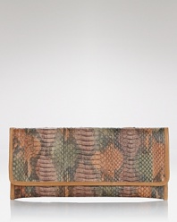 Take the textured leather trend out for the evening with this snakeskin clutch from Carlos Falchi. Ideally sized for the essentials, it's a must for the nocturnal creature.
