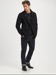 Remain stylish and warm this winter in this outerwear wardrobe essential, handsomely crafted in a luxurious wool and nylon blend for superior comfort.Button-frontWaist slash pocketsRear ventAbout 27 from shoulder to hem90% wool/10% nylonDry cleanImported