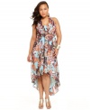 Dazzle at your special events this season with Baby Phat's halter plus size maxi dress, punctuated by a high-low hem.