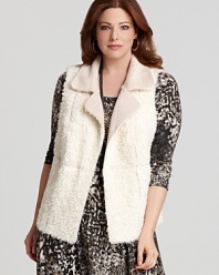 Reverse seaming lends intrigue to this Karen Kane faux fur vest--a glamorous accent to your seasonal wardrobe.