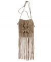 Got a flair for fringe? Lucky Brand satisfies that craving with this hippie-chic fringe crossbody that is totally far out. Tonal macrame fringe decorates bag with diamond shaped mid-section detail.