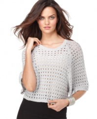 A hot layering piece, this BCBGMAXAZRIA open-stitch sweater adds on-trend texture to any outfit!