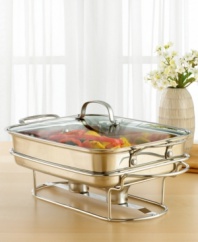 Now that's entertaining! Elegant and modern, this sleek buffet server lets guests help themselves, keeping food warm with 18/10 stainless steel construction and an aluminum-encapsulated bottom for fast and even heat distribution. Bring the pan directly from the oven or stovetop to buffet for a fresh, beautiful culinary display. Limited lifetime warranty.