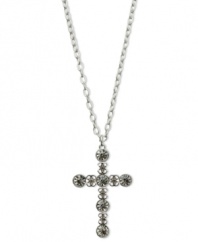 Keep the faith. This pendant necklace from GUESS showcases a cross design embellished with logos and crystal accents. Crafted in silver tone mixed metal. Approximate length: 32 inches + 2-inch extender. Approximate drop: 2-1/2 inches.