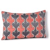 Add a fresh dose of bright color and pattern to your bedroom with this bold decorative pillow.