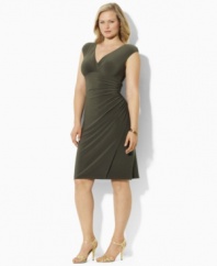 Designed in luxe satin with a hint of stretch, the Lauren by Ralph Lauren dress features cap sleeves and a chic, crossover neckline for elegant appeal.