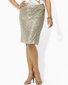 A polished pencil skirt captures classic elegance in a chic sequined construction.