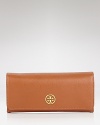 Loved for it's polished look, Tory Burch's continental wallet is an ever chic essential. With ten credit card pockets and an interior zip pocket, this latest piece from the NYC label offers the substance to match the style.