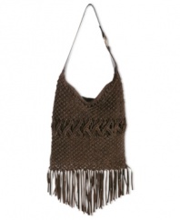 Your inner hippie-chic is calling. Answer it with this boho-fabulous design from Lucky Brand that lends a laid-back look to any outfit. Fun fringe and macramé adorn the outside, while the inside offers a safe haven for wallet, phone, makeup case and any other little extras.