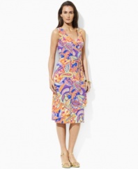 Smooth paisley jersey flatters the body in a feminine petite A-line silhouette with an elegant cross-wrap neckline, from Lauren by Ralph Lauren. (Clearance)