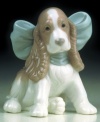 Take man's best friend home--in the form of this adorable sculpted puppy.