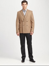 Made from an Italian wool/nylon blend, a blazer with peak lapels and a structured fit. Double-breasted styleLong sleevesAbout 29 from shoulder to hem< 80% wool/20% nylonDry cleanImported of Italian fabrication