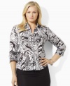 A black-and-white palette is redefined with vibrant florals on this classic Lauren by Ralph Lauren plus size shirt, tailored from crisp cotton broadcloth for a feminine take on a menswear staple. (Clearance)