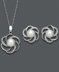 The perfect set of matching pinwheels. A cut-out spiral setting adorns this intricate jewelry set. Cultured freshwater pearls (6-7 mm) and diamond accents add shimmer and shine. Set in sterling silver. Approximate length: 18 inches. Approximate pendant drop: 7/8 inch. Approximate earrings drop: 1/2 inch.