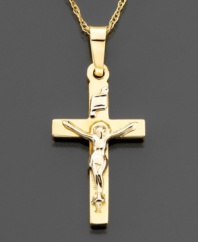 A small reminder of faith: this 14k gold crucifix pendant is approximated 1 inch in length. Chain not included.