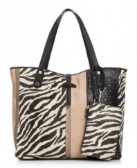Go for something wild with this safari-inspired shopper from Danielle Nicole. The contrast of colorblocking and zebra print pattern, accented with luxe golden hardware and slim tab closure, complete the look with delicate detail.