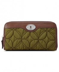 Join the clutch crowd with this vintage-inspired design from Fossil that does double duty. By day it's the essential organizer that slips into a tote or satchel, by night it's the perfect party piece to accent your out-on-the-town ensemble.