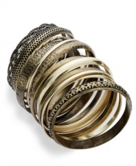 Lucky 13! Bar III's industrial-cool bangle set features 13 separate bangles. Includes a chic mix of gold and black tone with varying textures. Crafted in burnish copper-plated mixed metal. Approximate diameter: 2-1/2 inches.