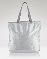 Practical style gets a touch of sparkle with this top handle tote from Le Sportsac. Roomy and ritzy, this day bag lives to lend standard-issue denim an of-the-moment edge.