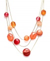 Infuse your look with summery style. Style&co.'s pretty three-row illusion necklace highlights coral-colored glass beads strung from delicate chains. Crafted from gold-plated mixed metal. Approximate length: 18-1/2 inches +2-inch extender. Approximate drop: 4 inches.