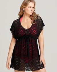 In mesh crochet, this diamond-patterned Becca Etc. coverup lends lightweight coverage to beach-bound afternoons.