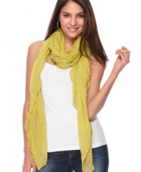 Light and airy, this gauzy scarf by Style&co. is perfect for adding a pop of color to a casual or corporate look.