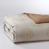 Inspired by the beauty of a floating lotus, this patterned duvet embodies simplicity and modern sophistication.