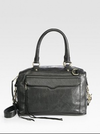 This classic and iconic style made in luxurious leather is perfect for all your essentials.Double top handles, 7½ dropDetachable shoulder strap, 19 dropTop zip closureProtective metal feetOne outside zip pocket under flapOne inside zip pocketTwo inside open pocketsCotton lining12½W X 7½H X 6½DImported