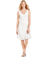 An allover burnout texture adds a stylish dimension to this bright white petite Calvin Klein dress -- a hot pick for a summer look!