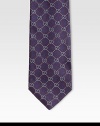 Signature GG pattern woven in superior Italian silk.About 3.1 wideSilkDry cleanMade in Italy