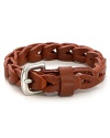 This braided leather bracelet is offset by a gold metal buckle for a classic masculine look.