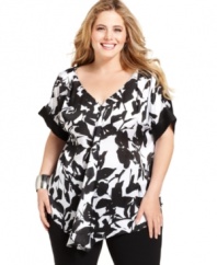 Featuring a gathered front, J Jones New York's short sleeve plus size top is a flattering addition to your wardrobe.